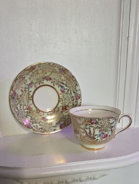 vintage Colclough bone china tea cup and saucer set featuring a chintz floral